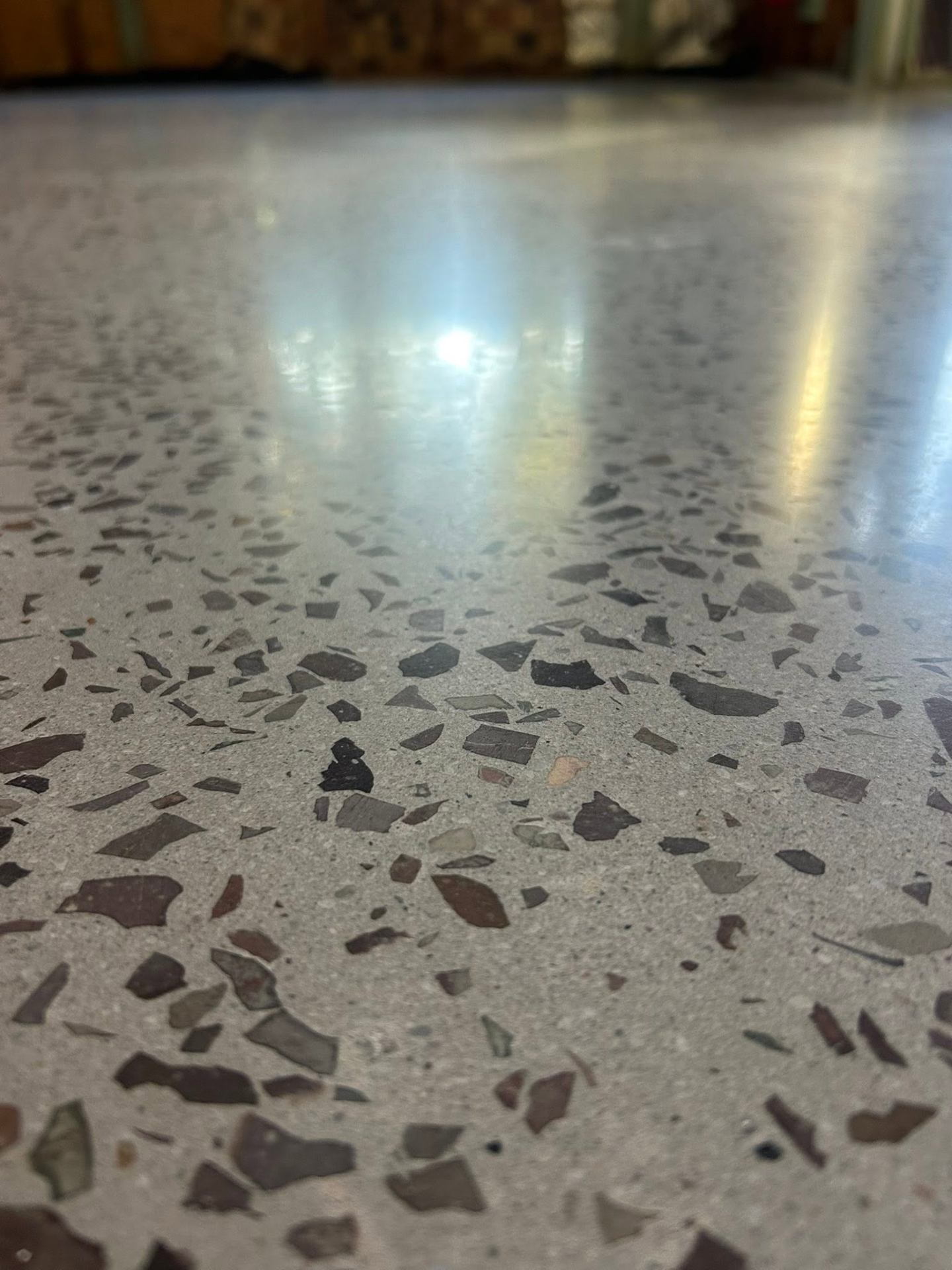 Metallic epoxy — Marbled, luminous floors for retail, hospitality & feature spaces.