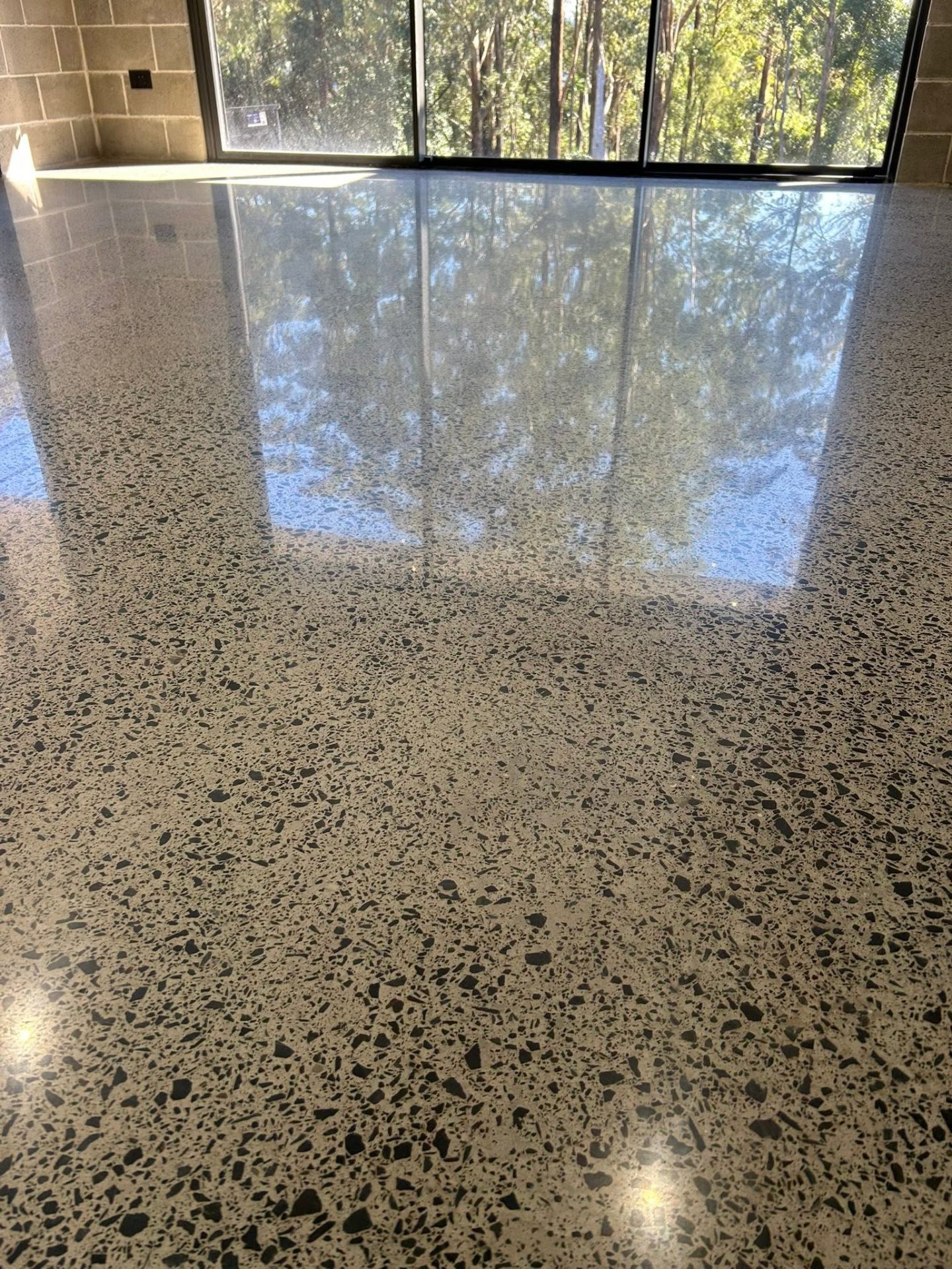 Polished concrete — Mechanical grind & polish for a mirror-hard finish.
