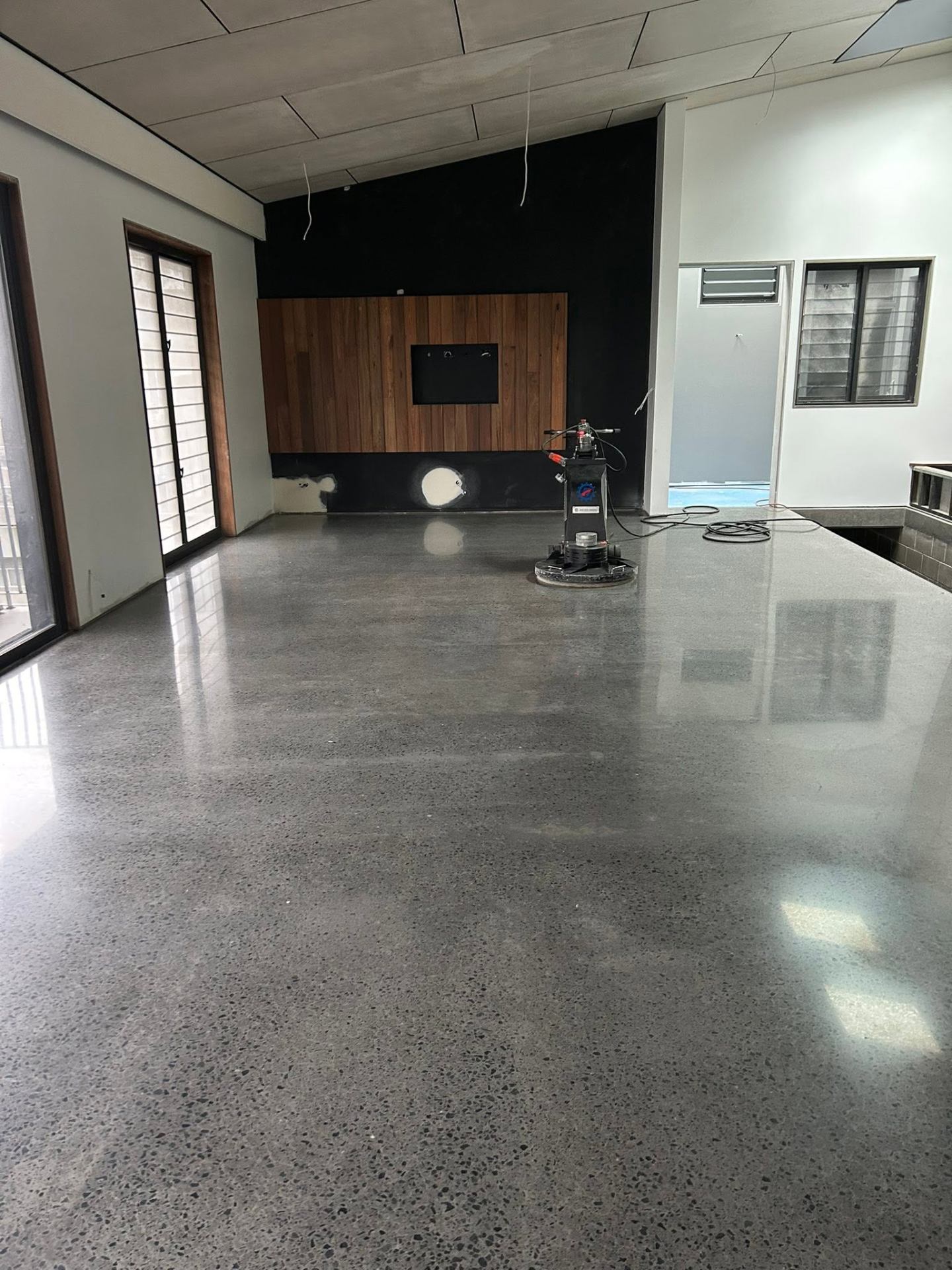 Interior living floor — Polished concrete floor in Sunshine Coast